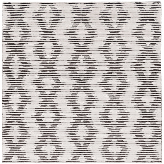 Magica - 710 - Ivory in Ivory Area Rugs